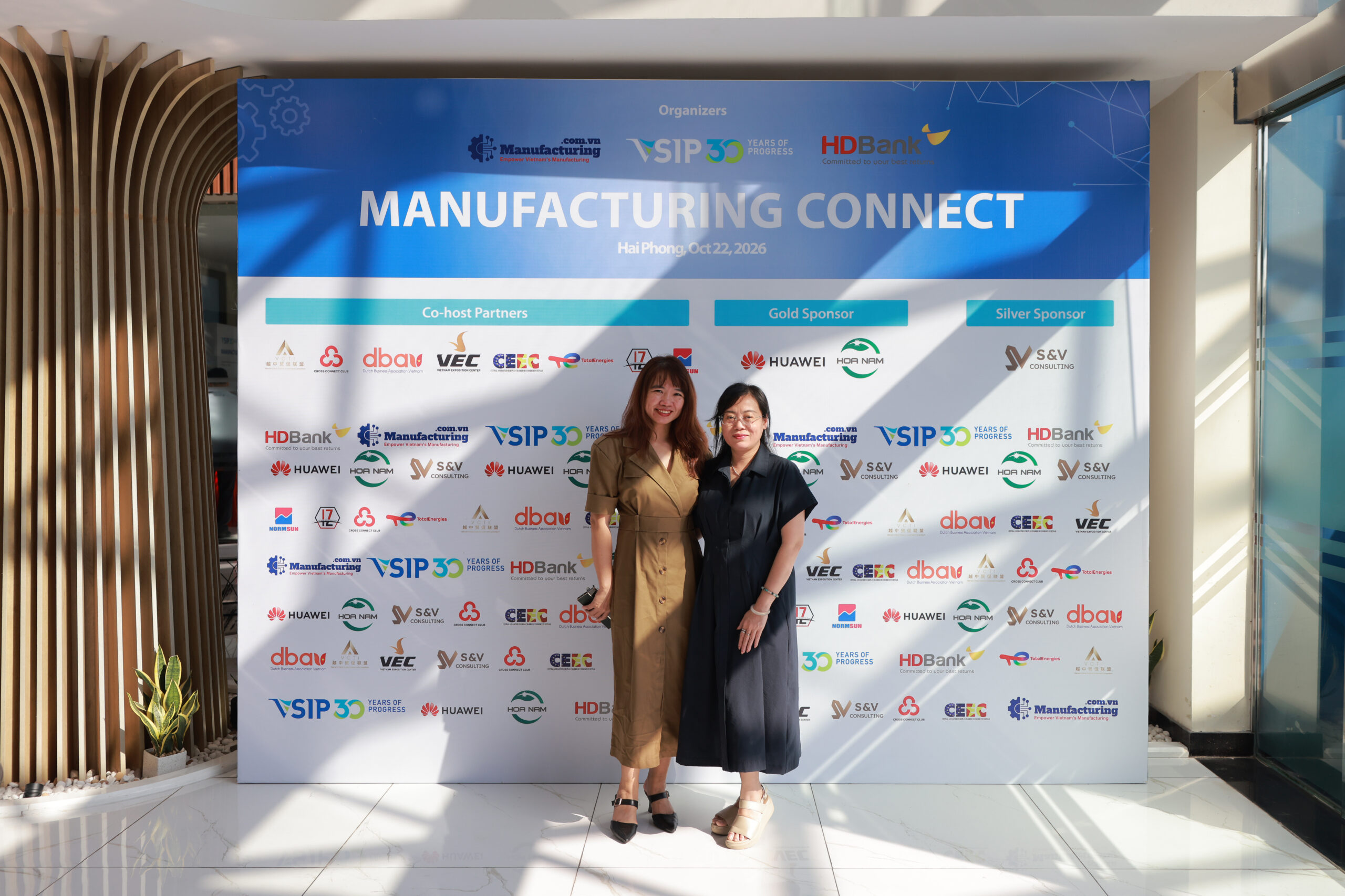 Representatives at the Manufacturing Connect backdrop with organizers VSIP Hai Phong and HDBank